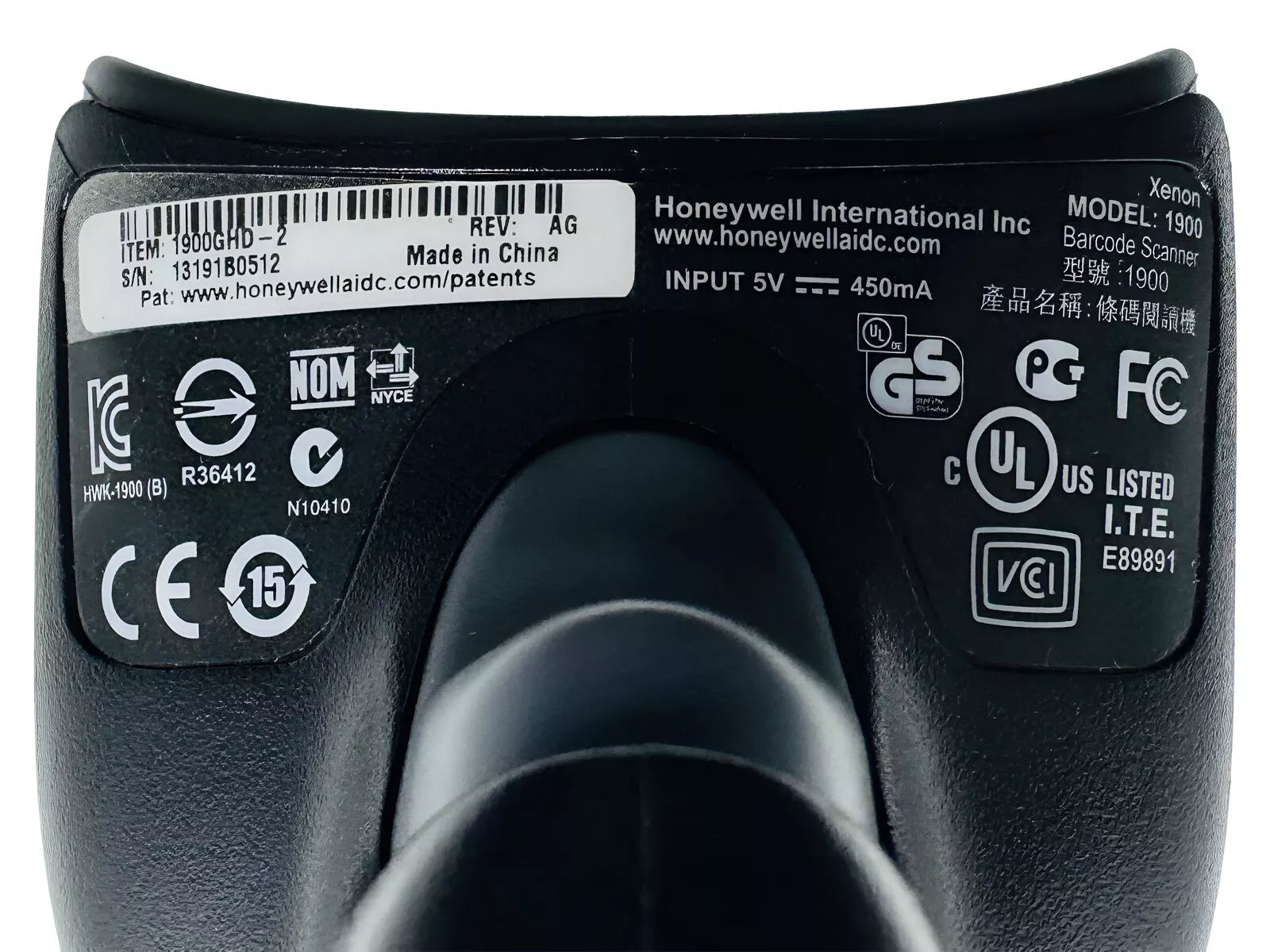 Rear housing with regulatory and model label
