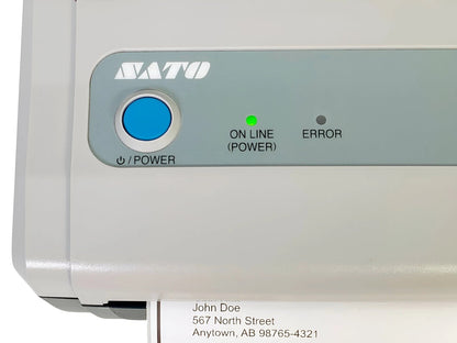 Control panel with power button and status indicators close up