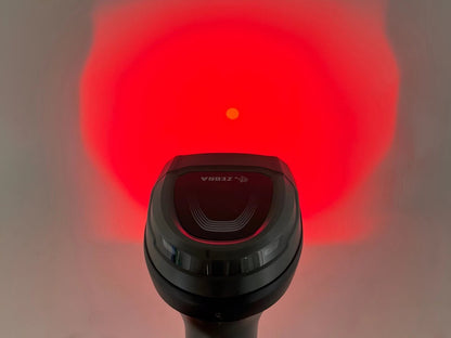 Red scanning illumination pattern projected during barcode reading