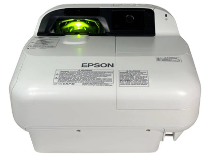 Ultra short throw projector front lens and sensor window