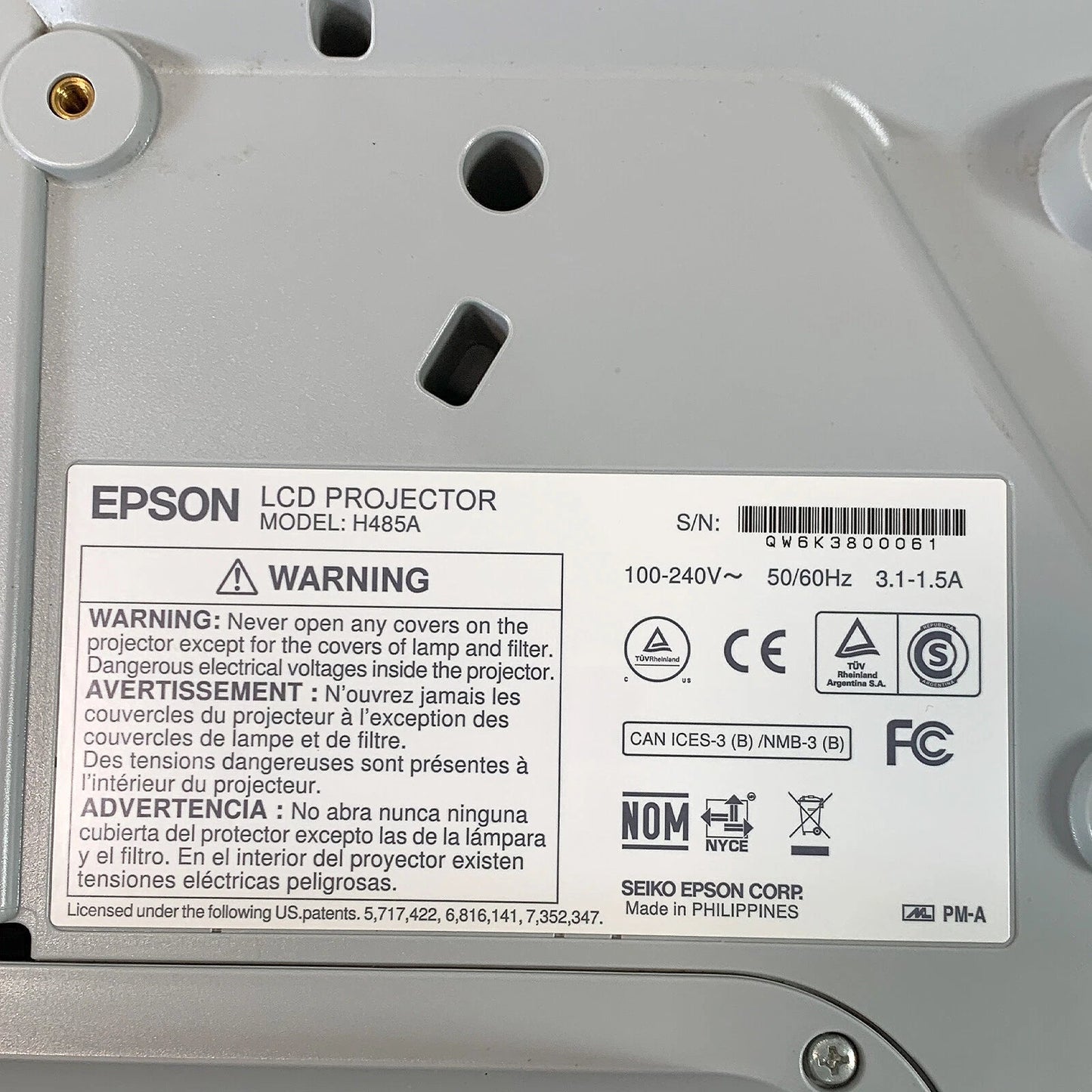 Bottom label with model information serial number and compliance markings