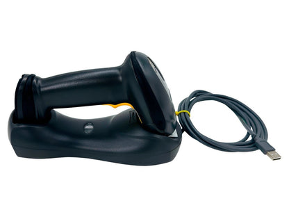 Bluetooth scanner docked in charging cradle side view