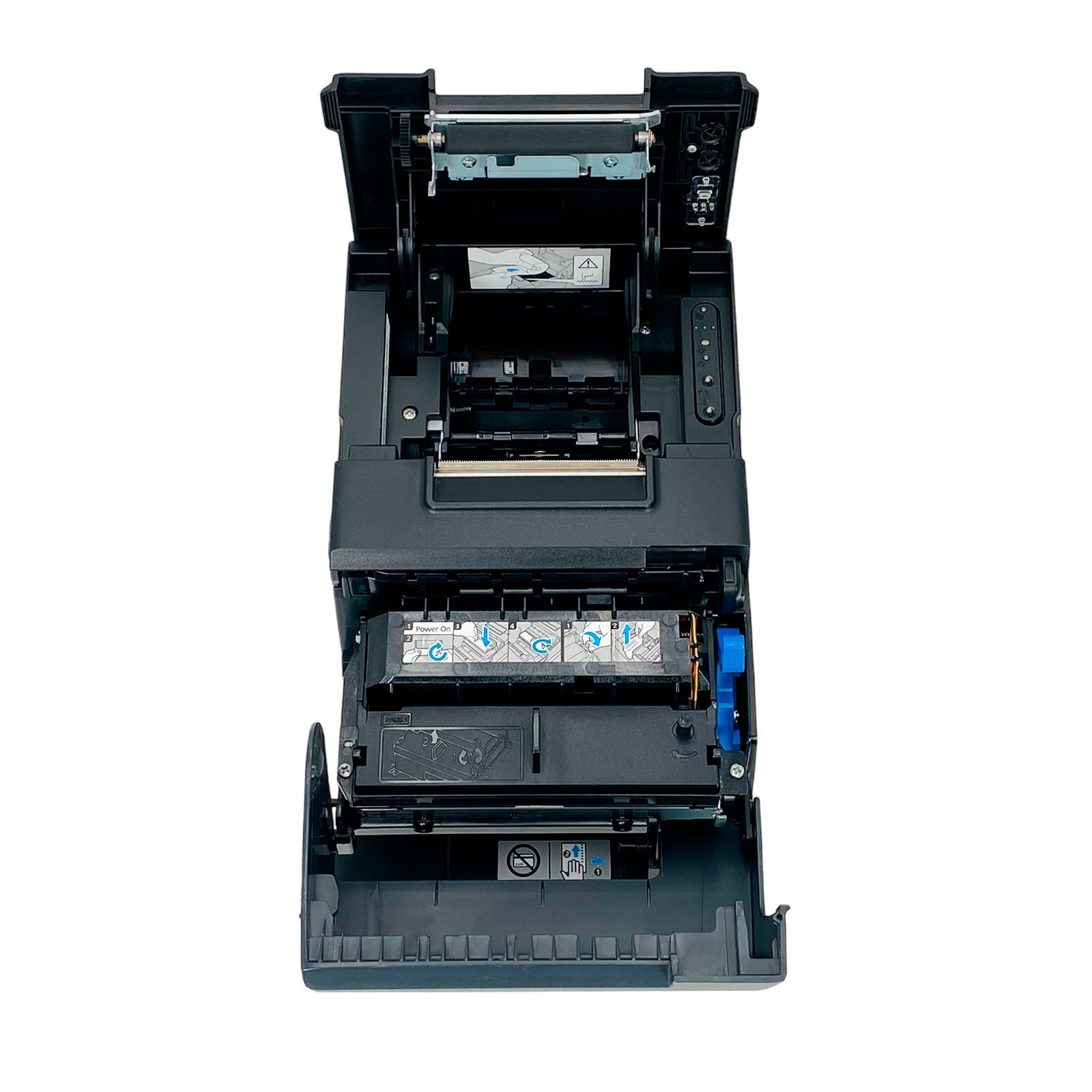 Open receipt paper compartment showing printhead and internal mechanism