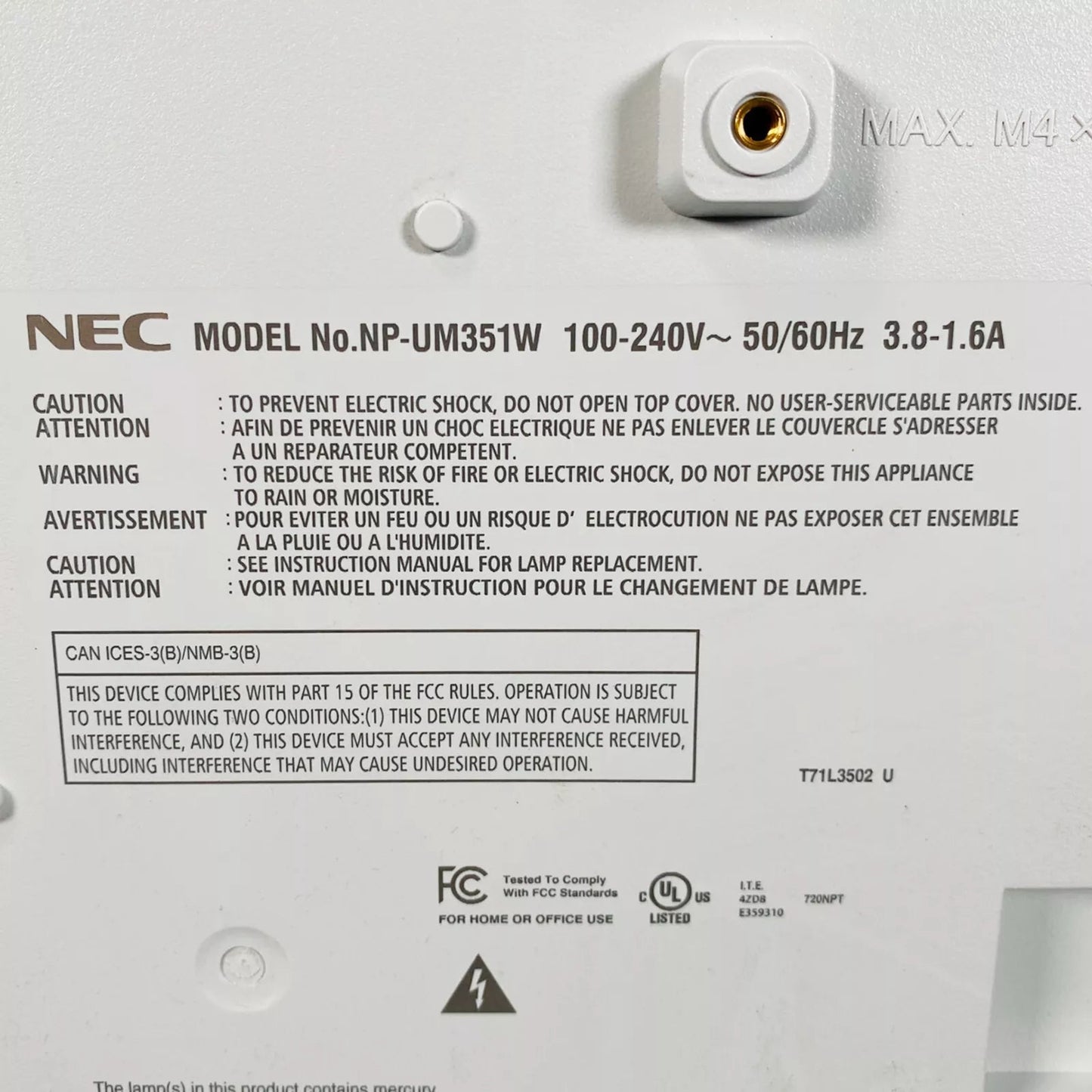 Bottom label with model number serial information and compliance markings