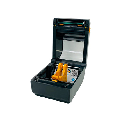 Angled view of open printer showing ribbon free direct thermal mechanism