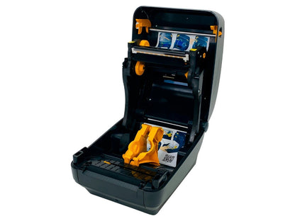 Thermal transfer printer open cover showing ribbon and media path