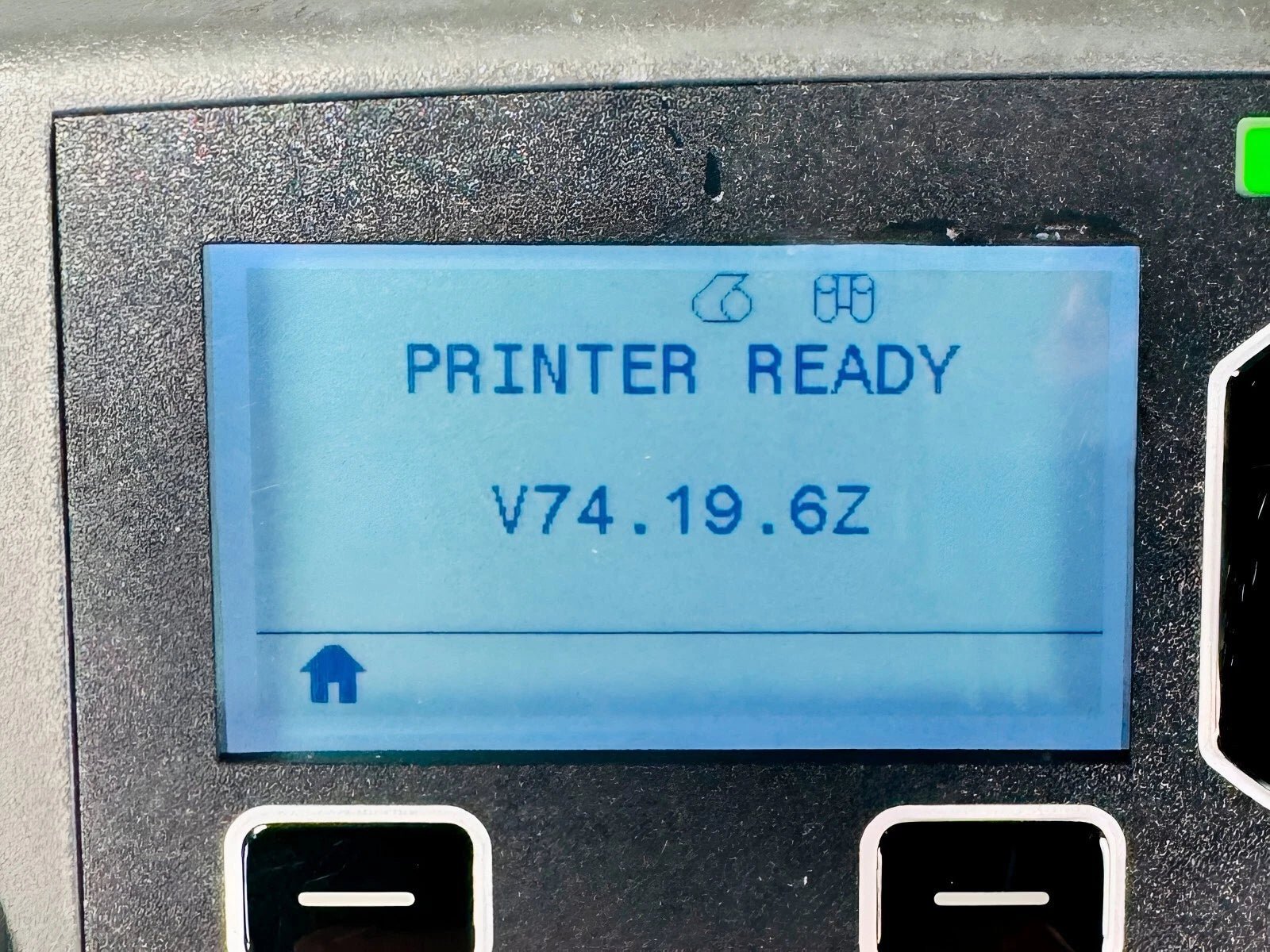 Thermal label printer LCD display showing printer ready status