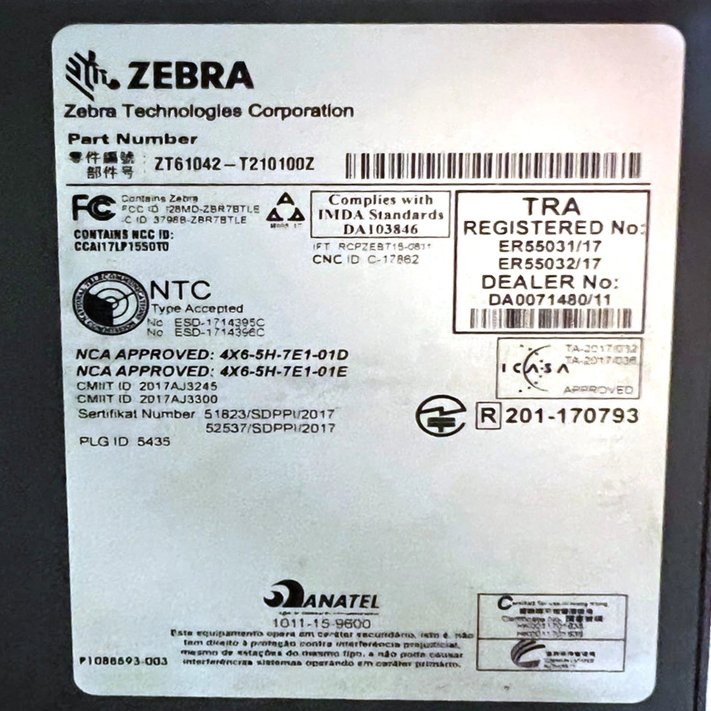 Certification label with compliance information and approval markings