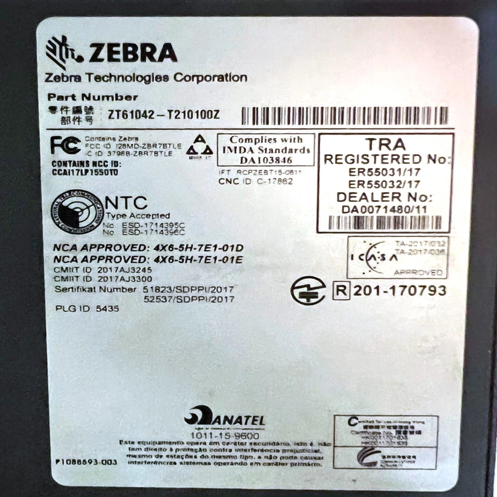 Certification label with compliance information and approval markings